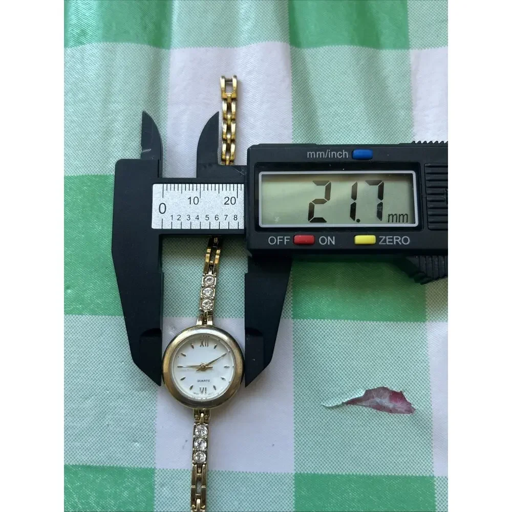 Gold Tone Rhinestone Band Women’s Quartz Watch